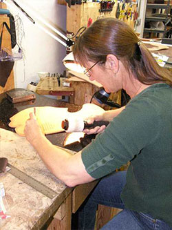 Ansur saddlemaker constructing a handmade treeless saddle